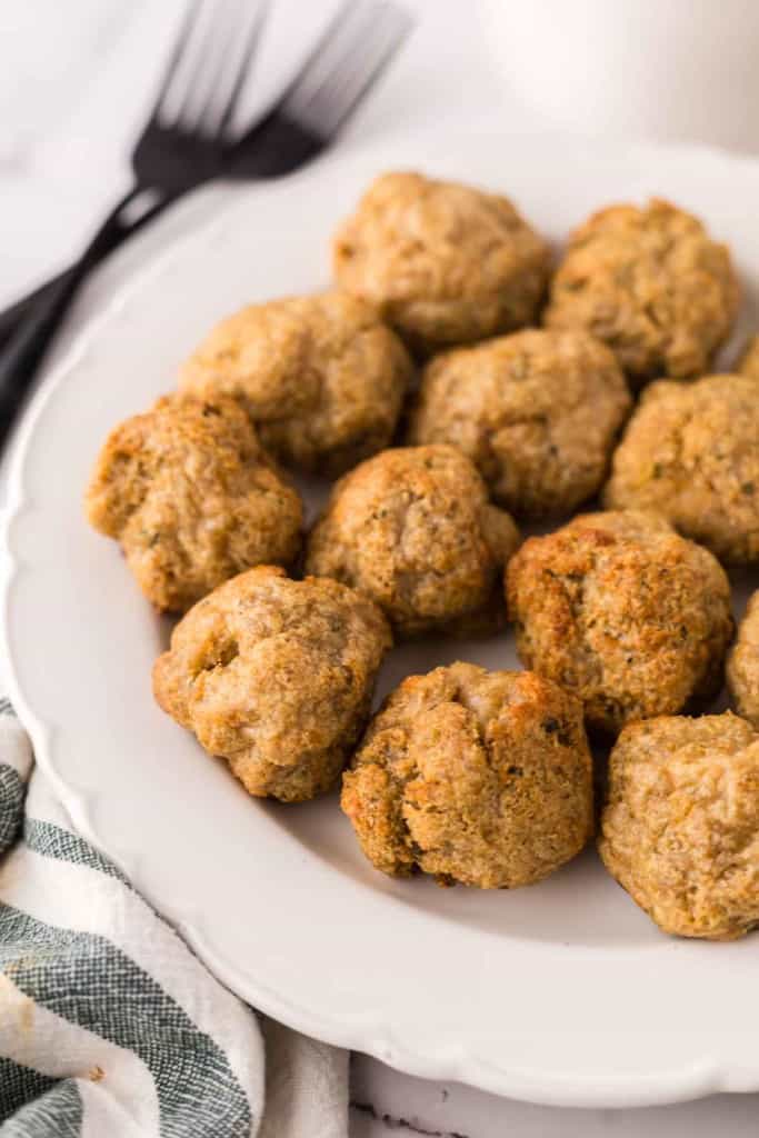 chicken meatballs on a round white plate.