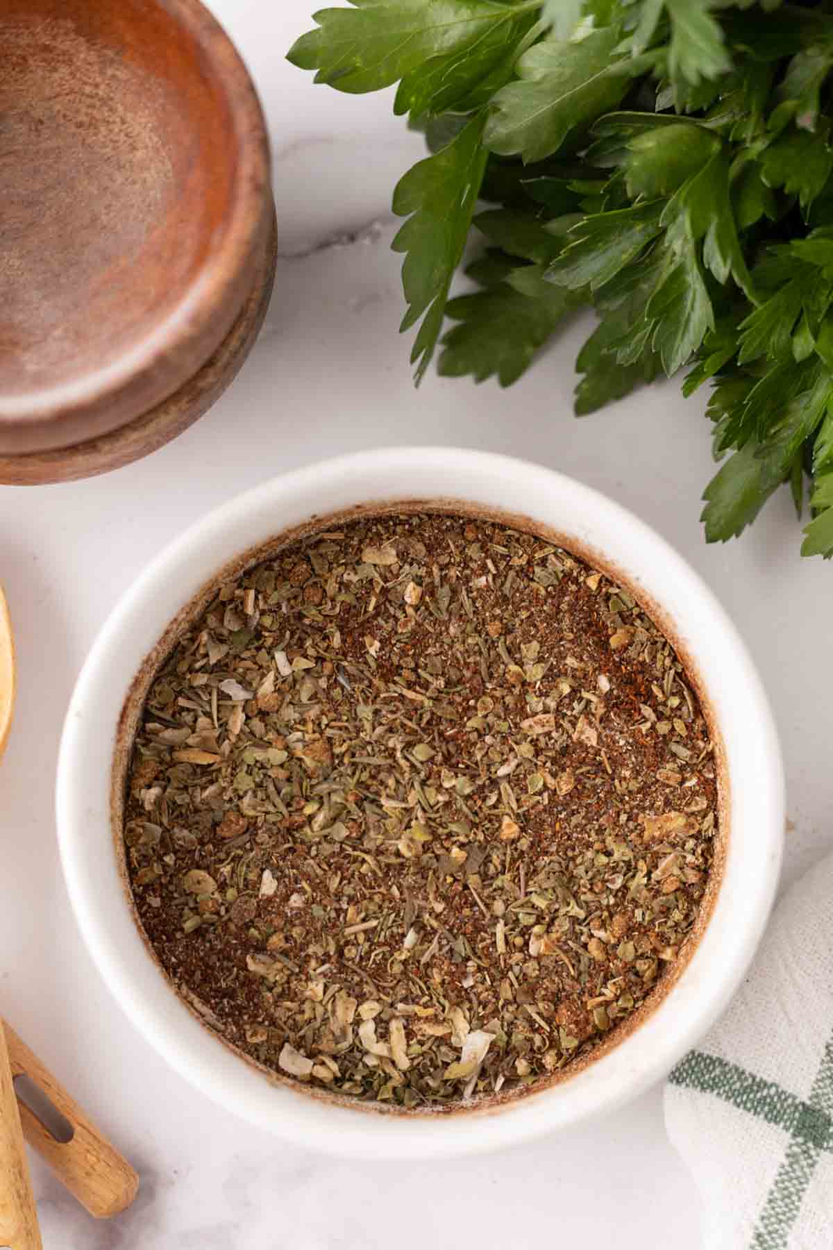 small white bowl with chili seasoning.