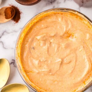 glass mixing bowl of homemade chipotle sauce.