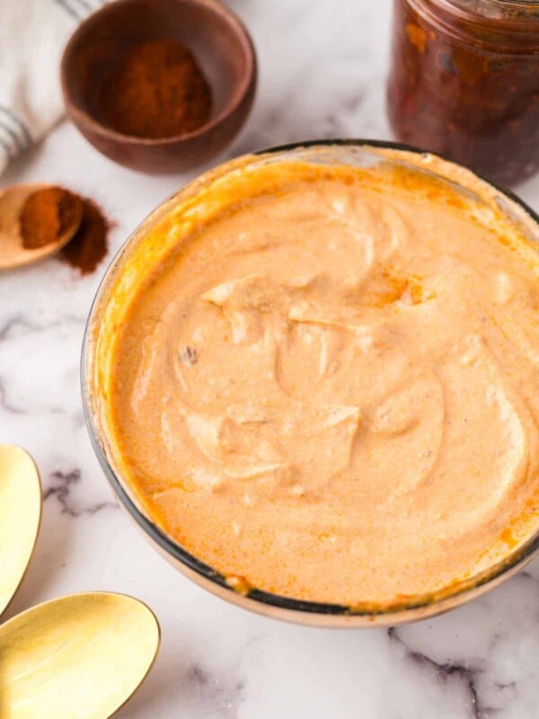 glass mixing bowl of homemade chipotle sauce.