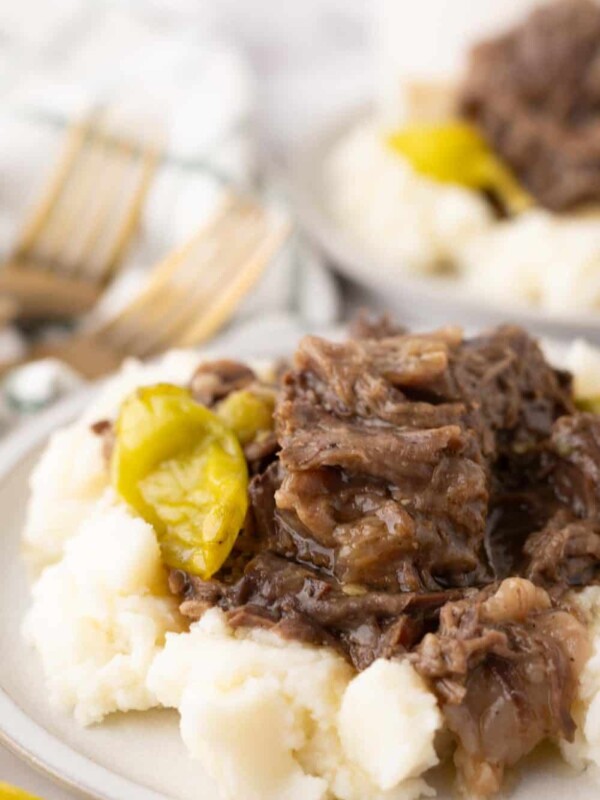 tender Mississippi shredded pot roast with pickled banana peppers over rice.