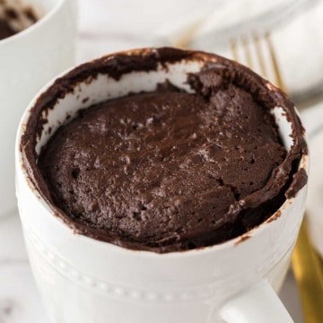 Chocolate cake baked into a white coffee mug.