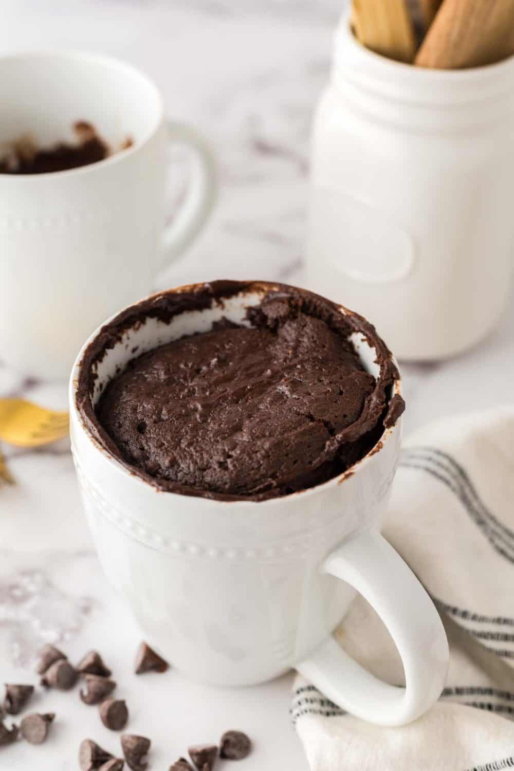 Chocolate cake baked into a white coffee mug.