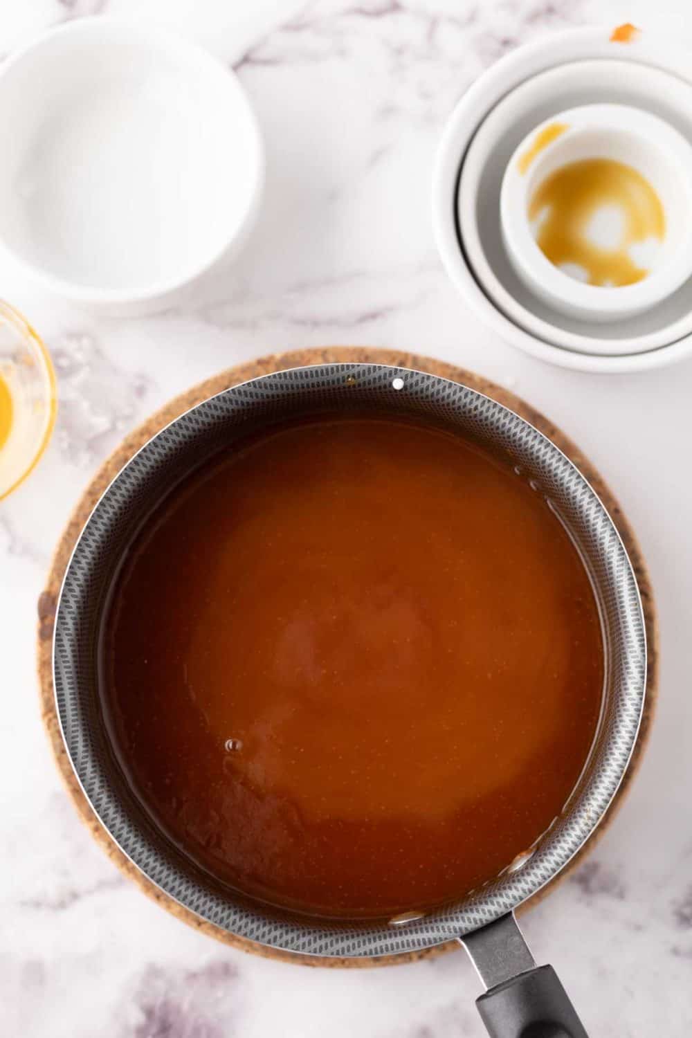 Pan of sweet and sour sauce.