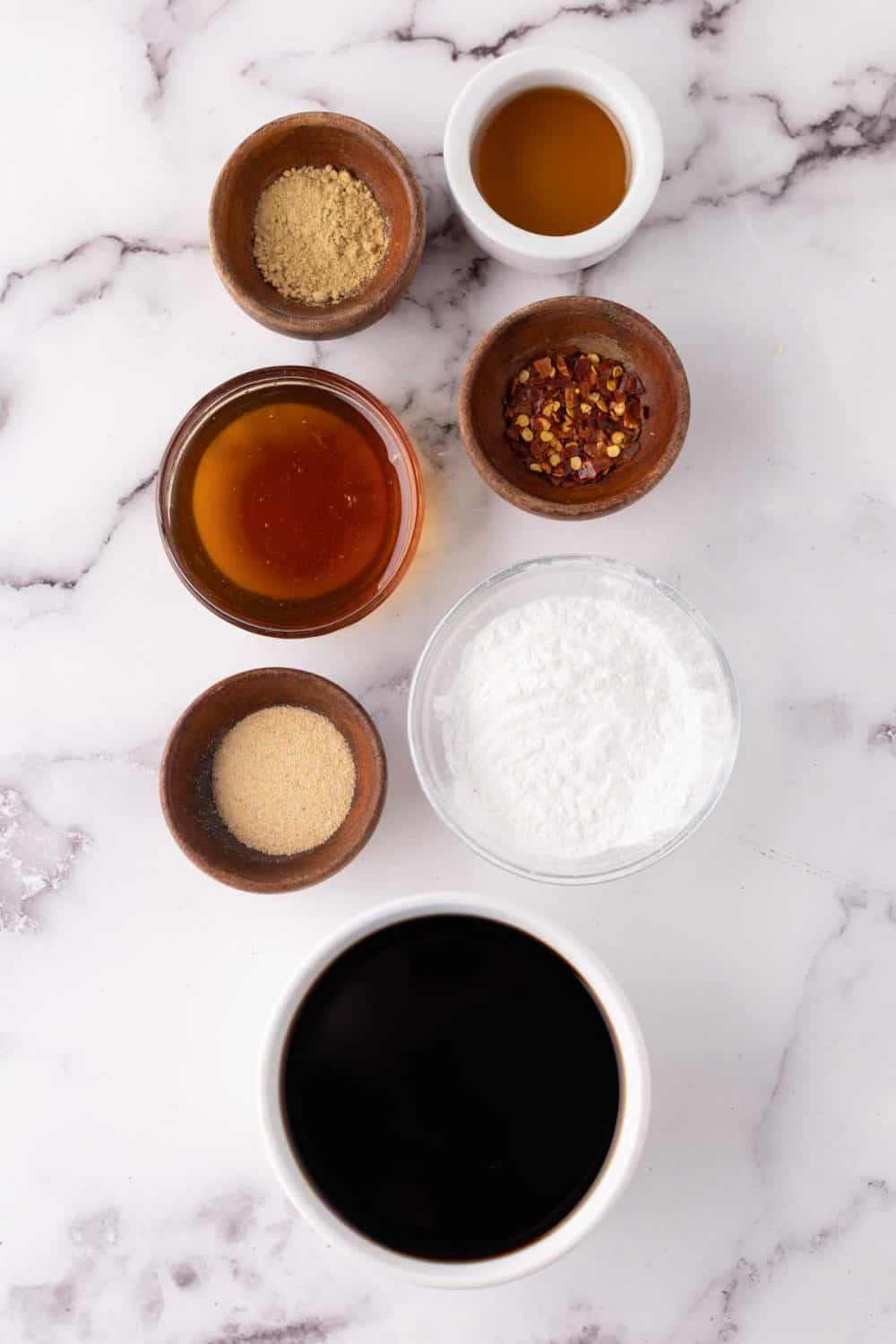 portion bowls with each raw ingredient to make teriyaki sauce.