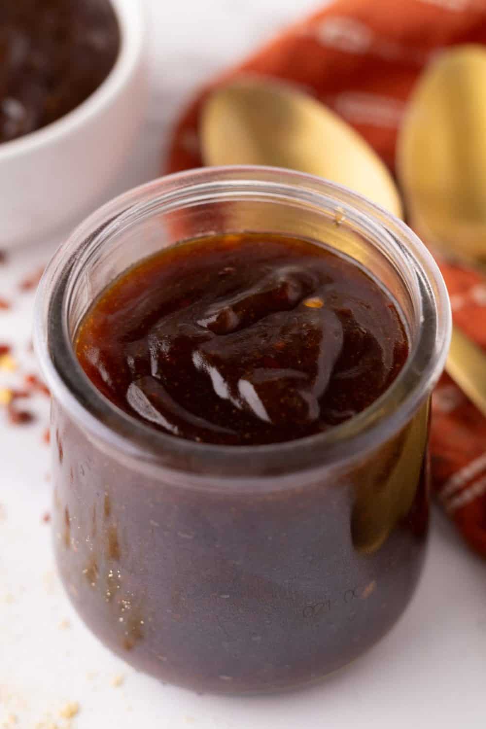 teriyaki sauce in a small glass jar.
