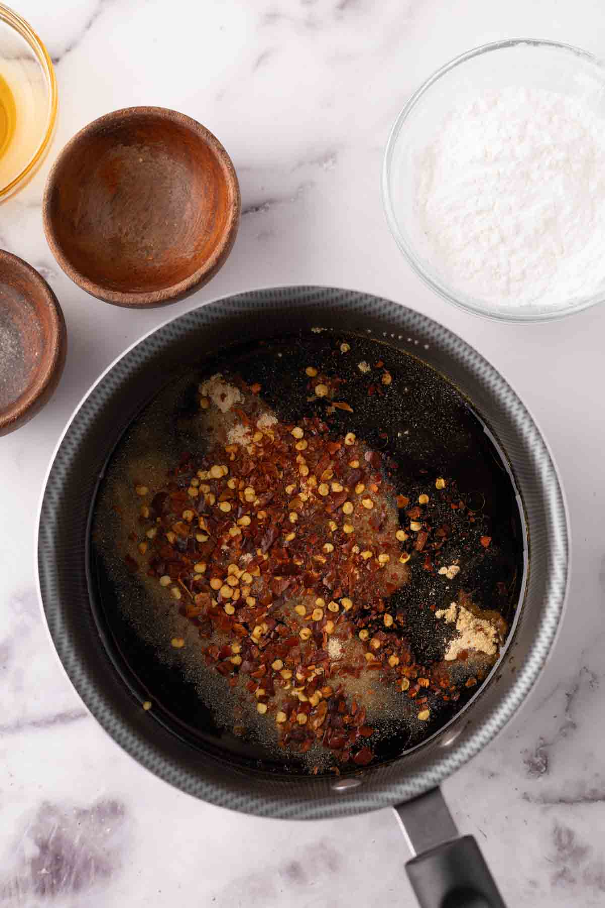 teriyaki sauce in a sauce pan in progress.