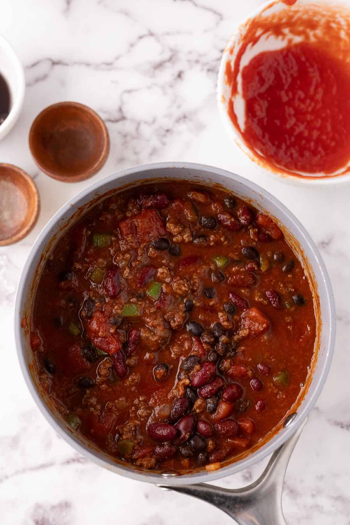 Ingredients for Wendy's chili in a pot.