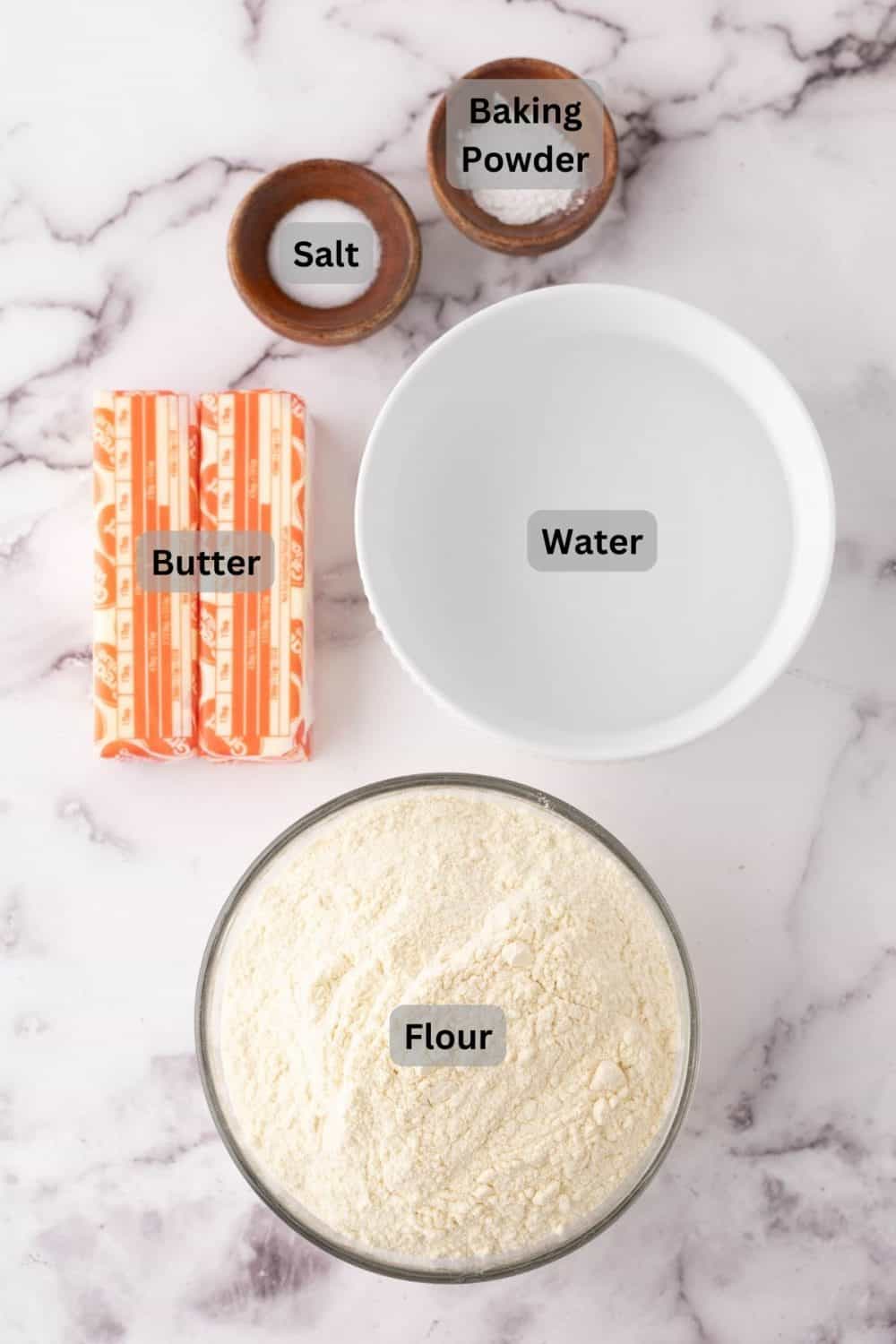 portion bowls each with digitally labeled raw ingredients to make tortillas.