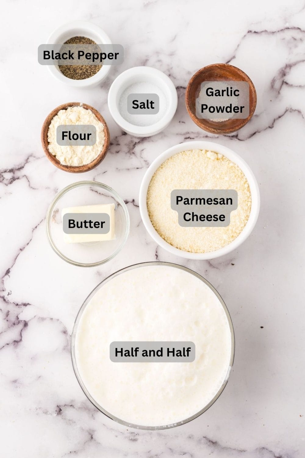 portion bowls with text labels for each raw ingredient to make white pizza sauce.