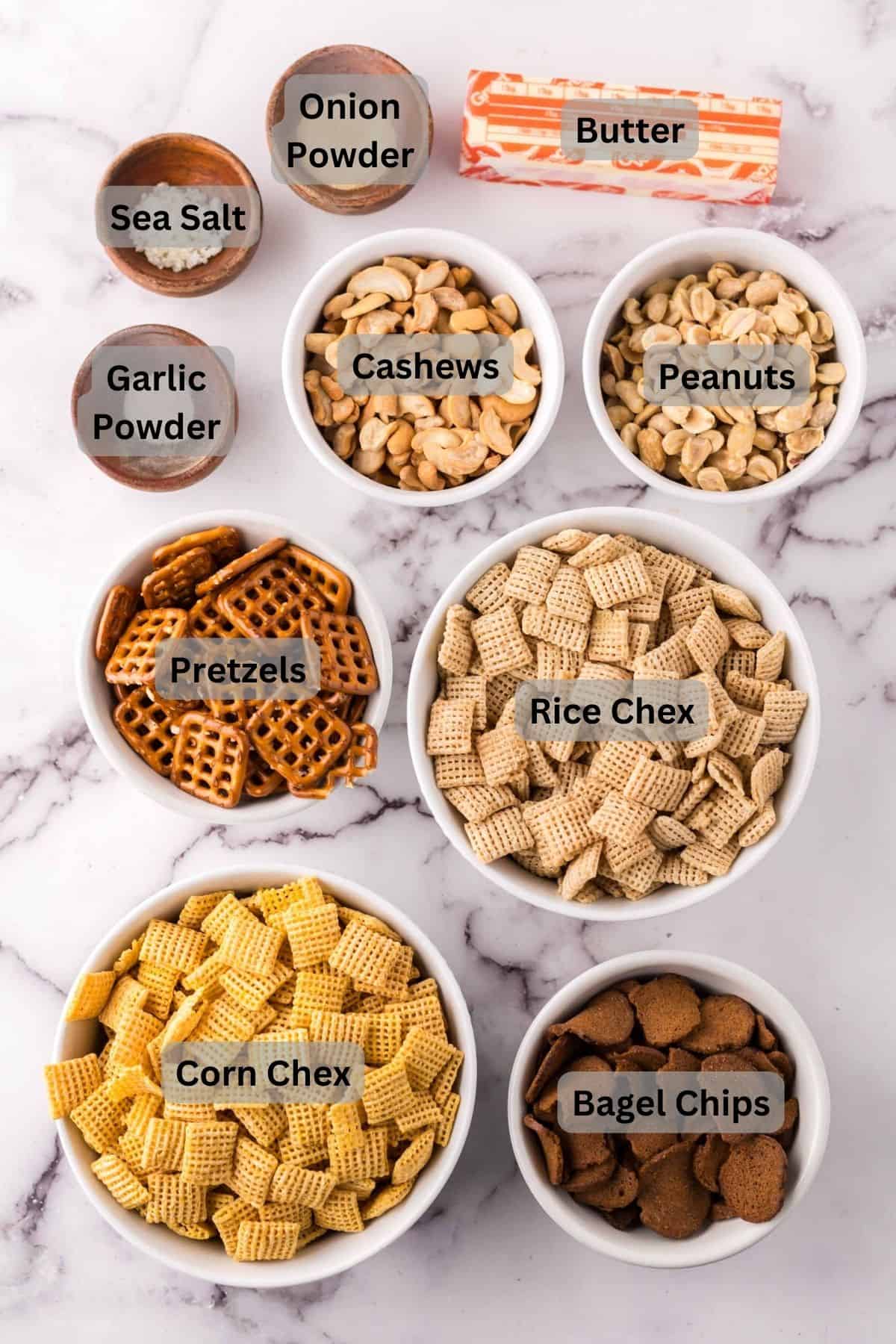 portion bowls each with digitally labeled raw ingredients to make Chex Mix.