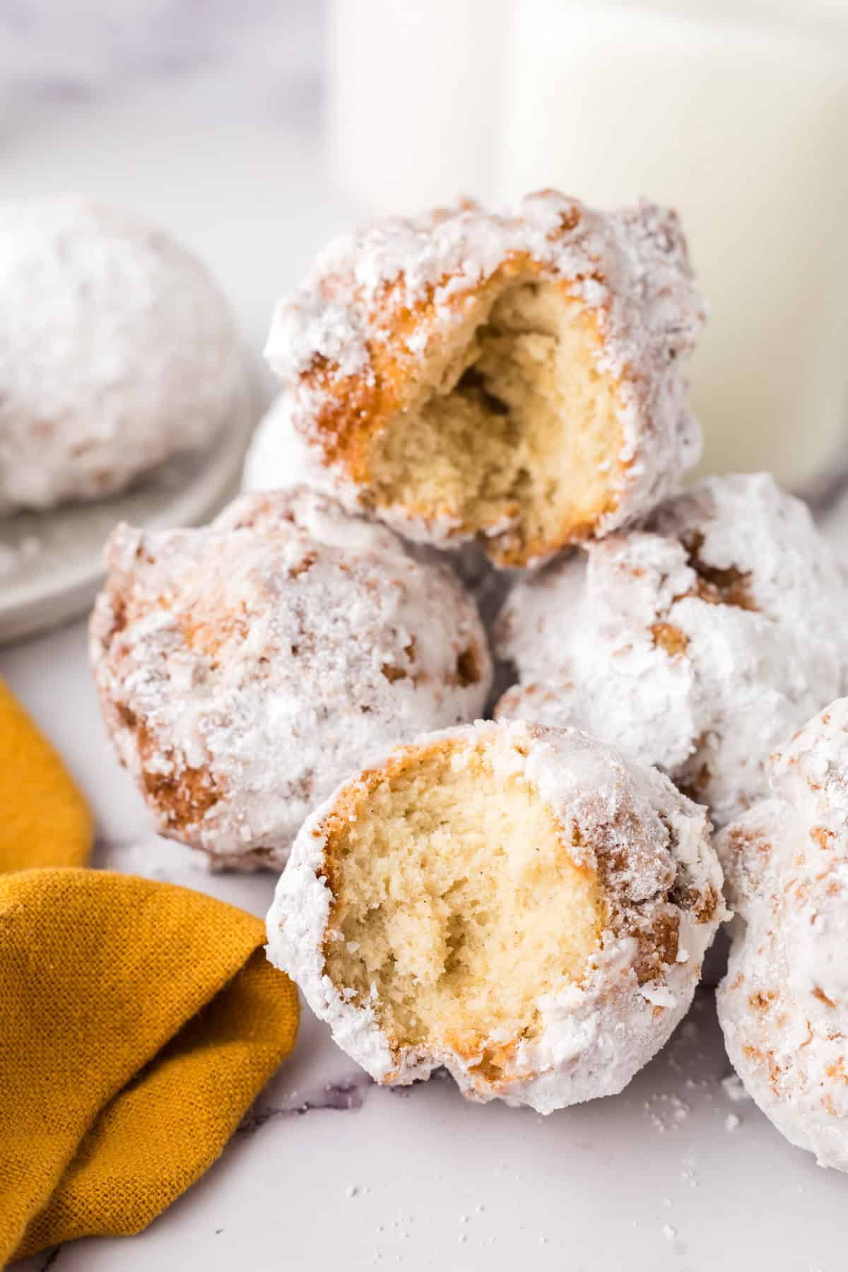 15 minute donut recipe balls dusted with powdered sugar.