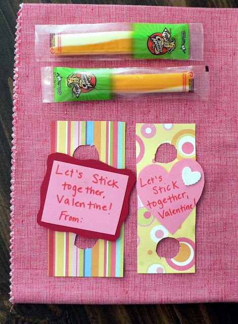 Cheese sticks with a note that says Let's stick together Valentine. 