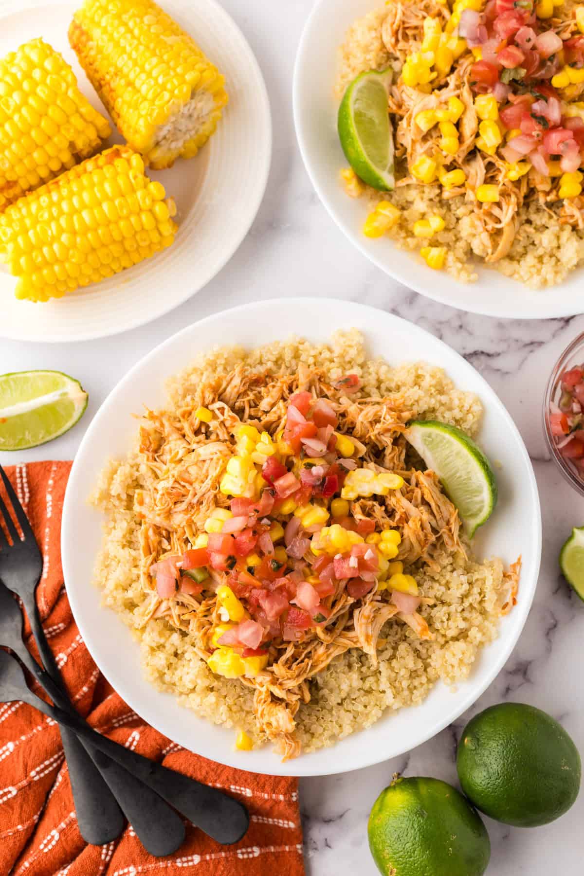 round white plate with the chipotle chicken burrito bowl recipe.