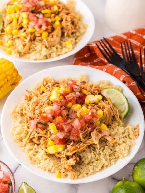 round white plate with the chipotle chicken burrito bowl recipe.