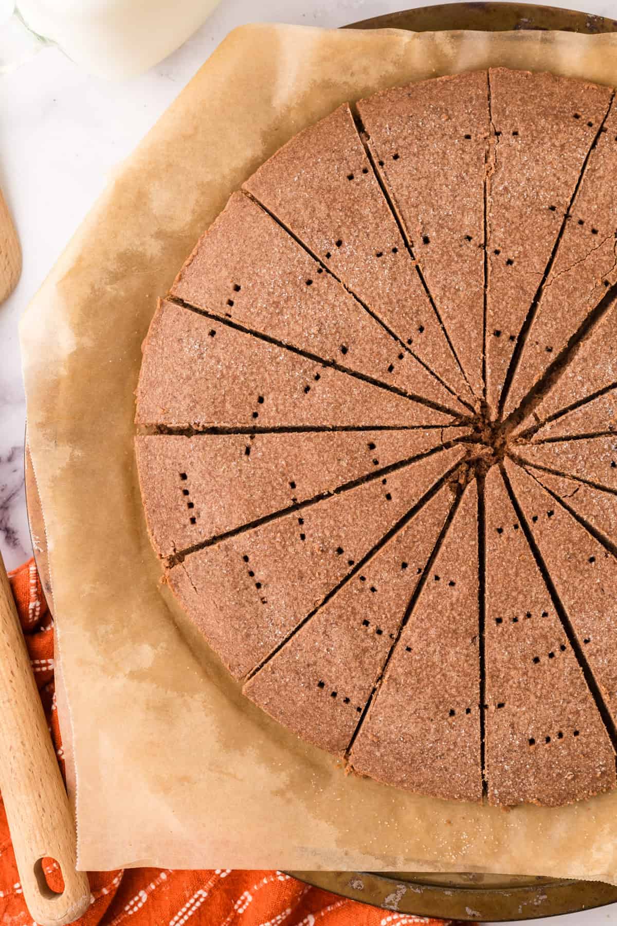 Chocolate shortbread sliced in several pieces.