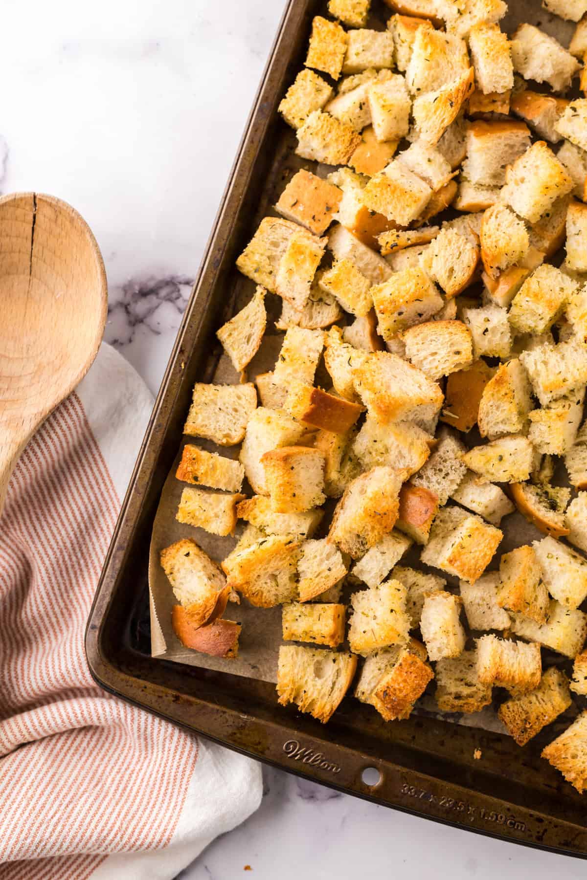 bakings sheet fresh from the oven with homemade crouton recipe.