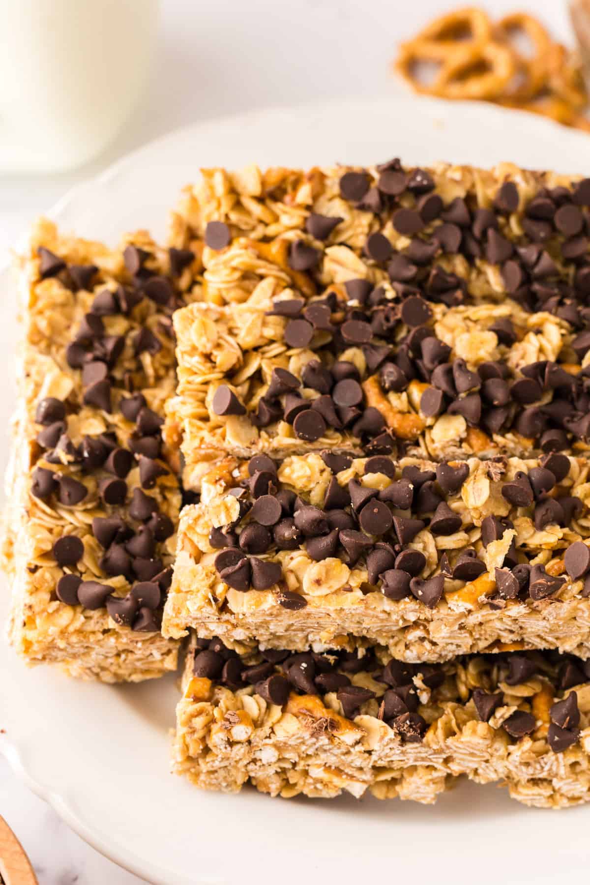 a plate of homemade granola bars with chocolate chips.