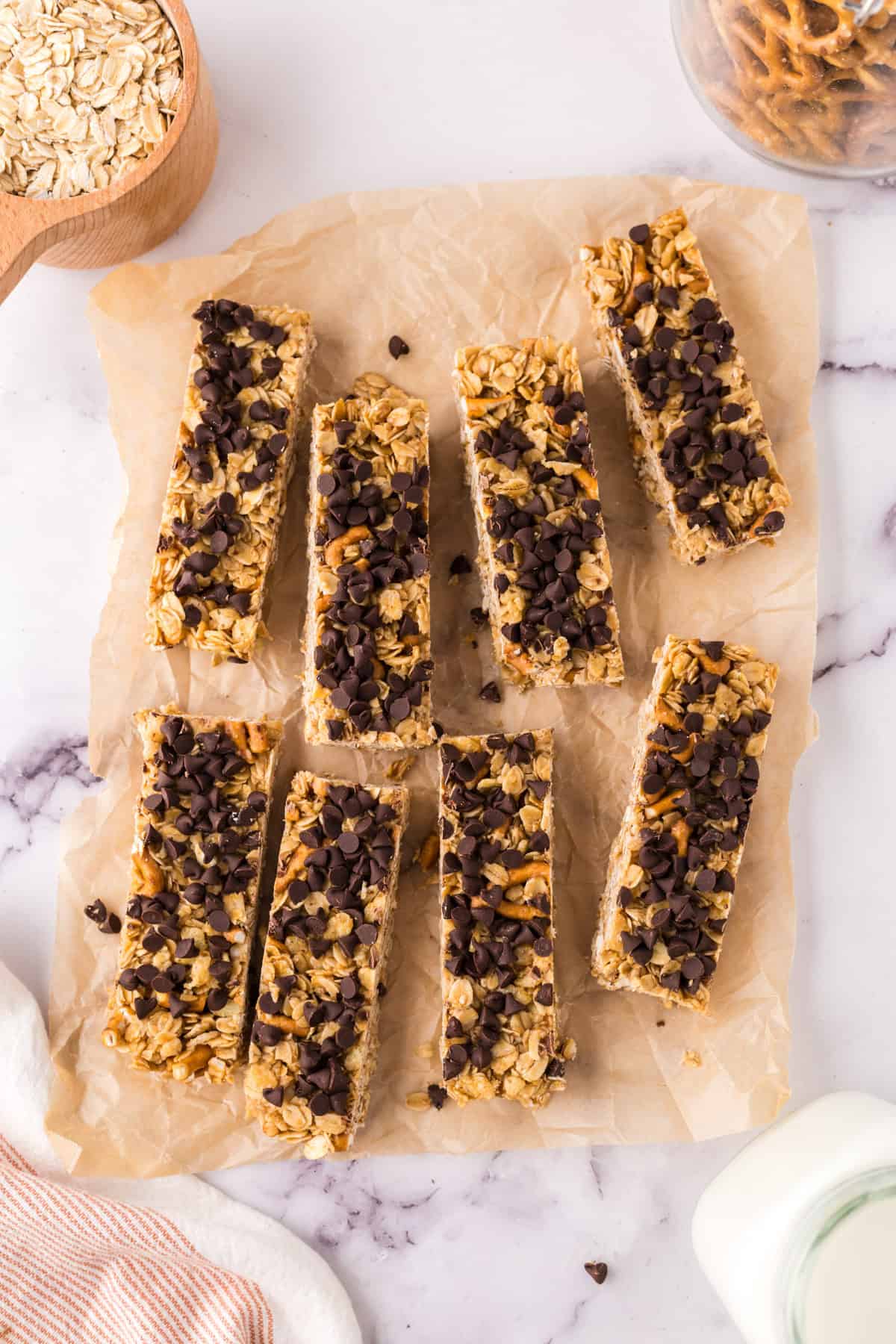 rectangle pieces of the homemade granola bar recipe over parchment paper.