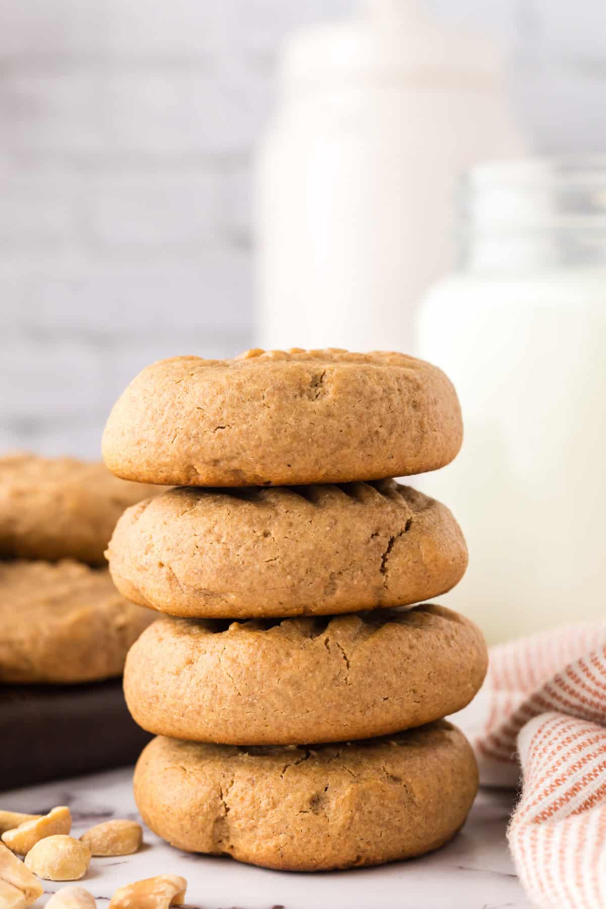 stack of four honey peanut butter cookies.