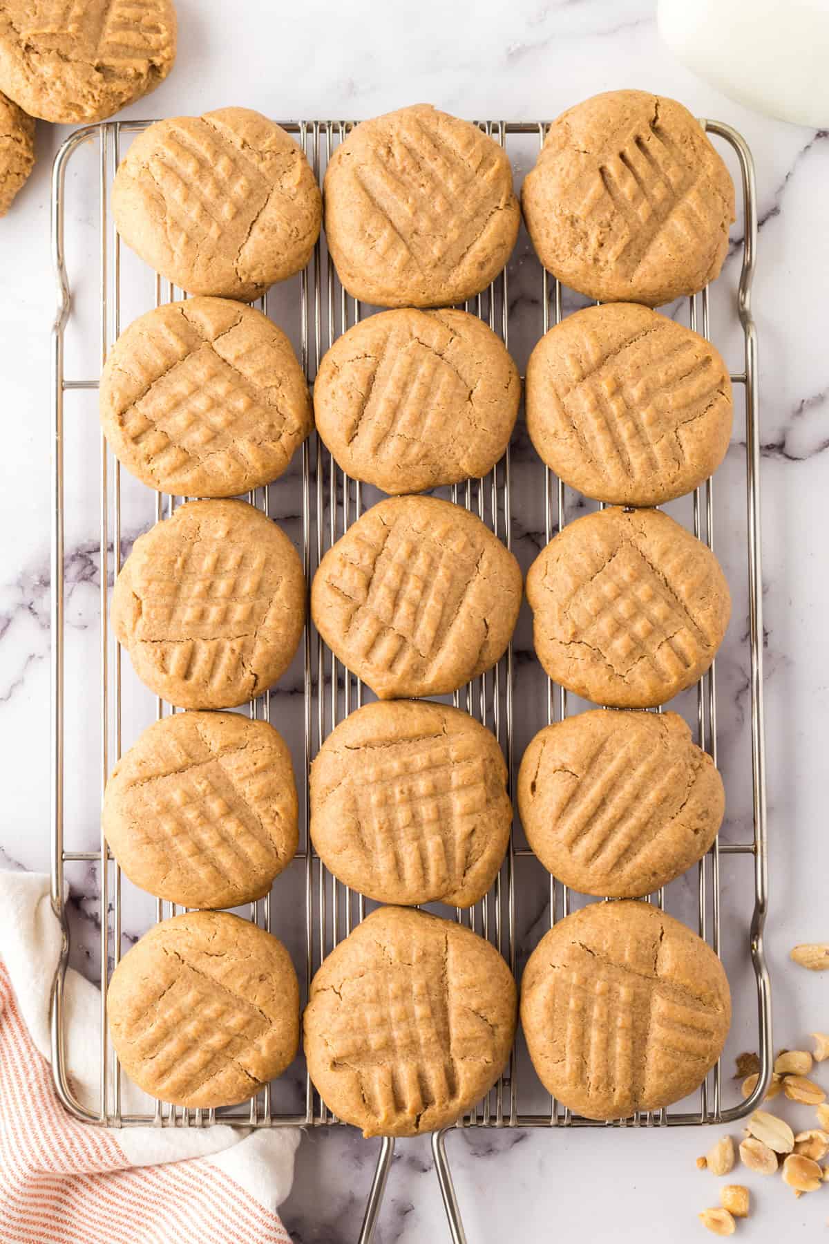 honey peanut butter cookies on a cooling rack.