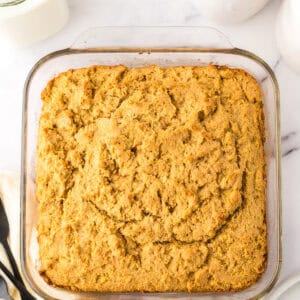 clear baking dish with whole wheat cornbread fresh out of the oven.