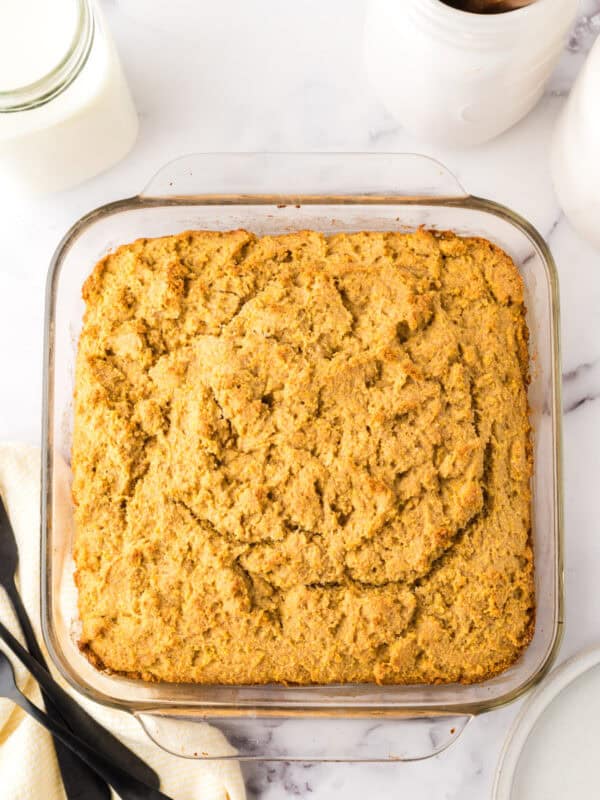 clear baking dish with whole wheat cornbread fresh out of the oven.