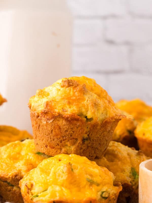baked cheddar bacon cornbread muffins on the counter.