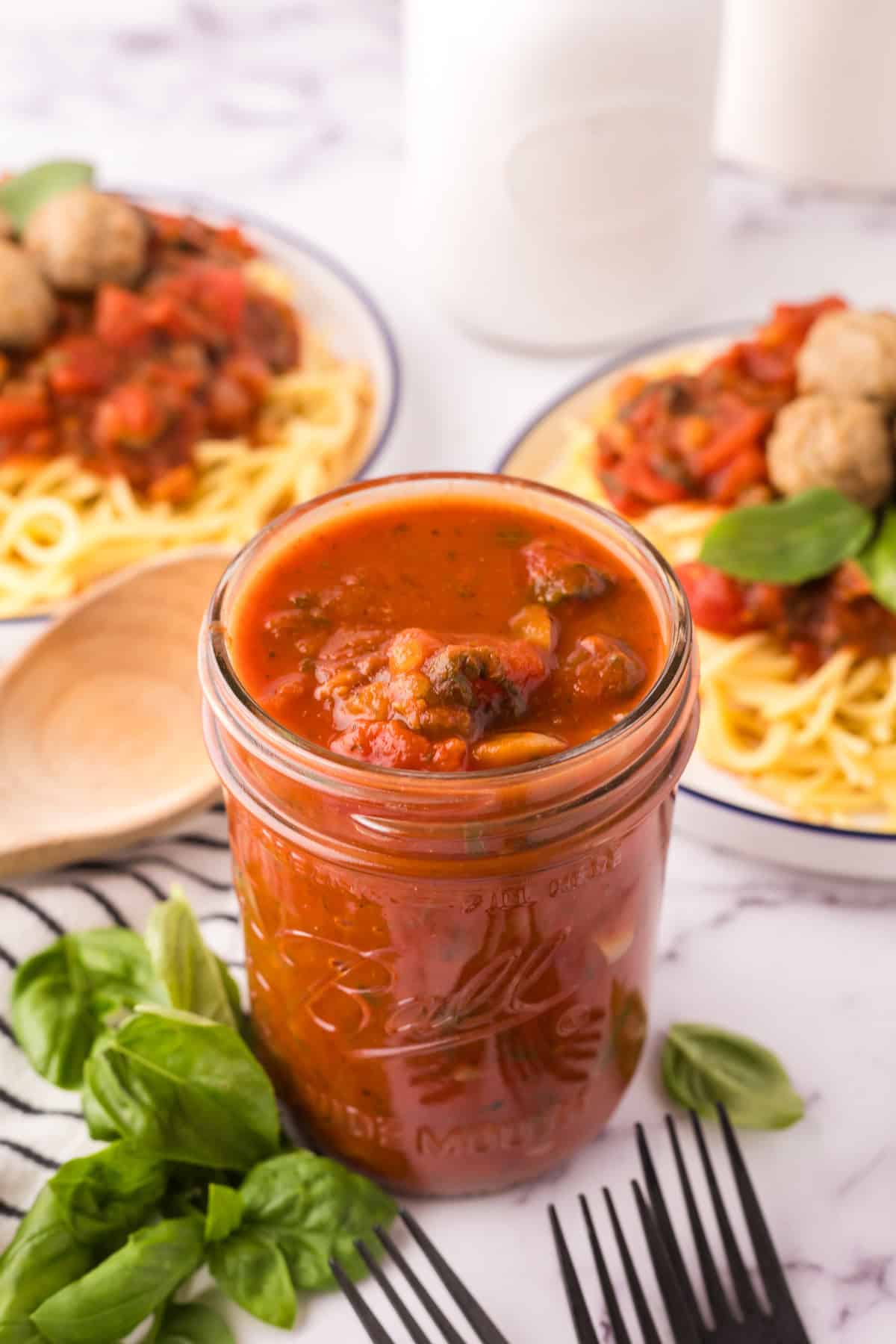 spinach mushroom marinara in a ball mason jar.