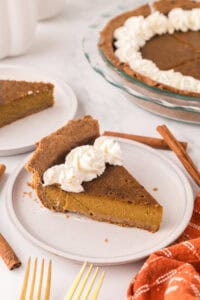 one slice of healthy pumpkin pie on a round plate.