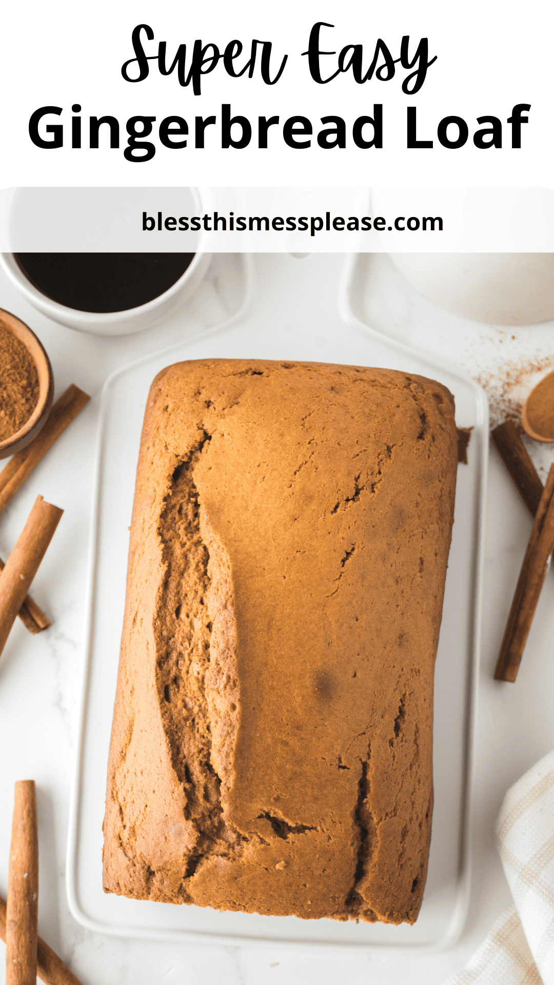 A freshly baked gingerbread loaf on a white plate, surrounded by cinnamon sticks and a bowl of ground cinnamon. A dark liquid is visible in a cup nearby. Text at the top reads Super Easy Gingerbread Loaf with a website link below.