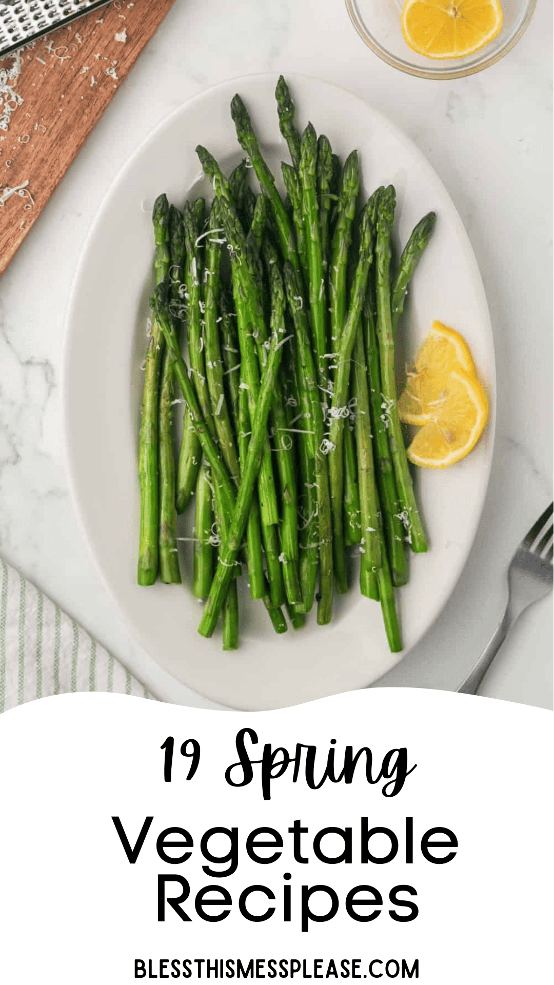 A white plate of cooked asparagus spears, a highlight among vegetable recipes for spring, is garnished with grated cheese and lemon wedges. The plate rests on a marble surface with part of a fork visible. Text reads 19 Spring Vegetable Recipes and blessthismessplease.com at the bottom.