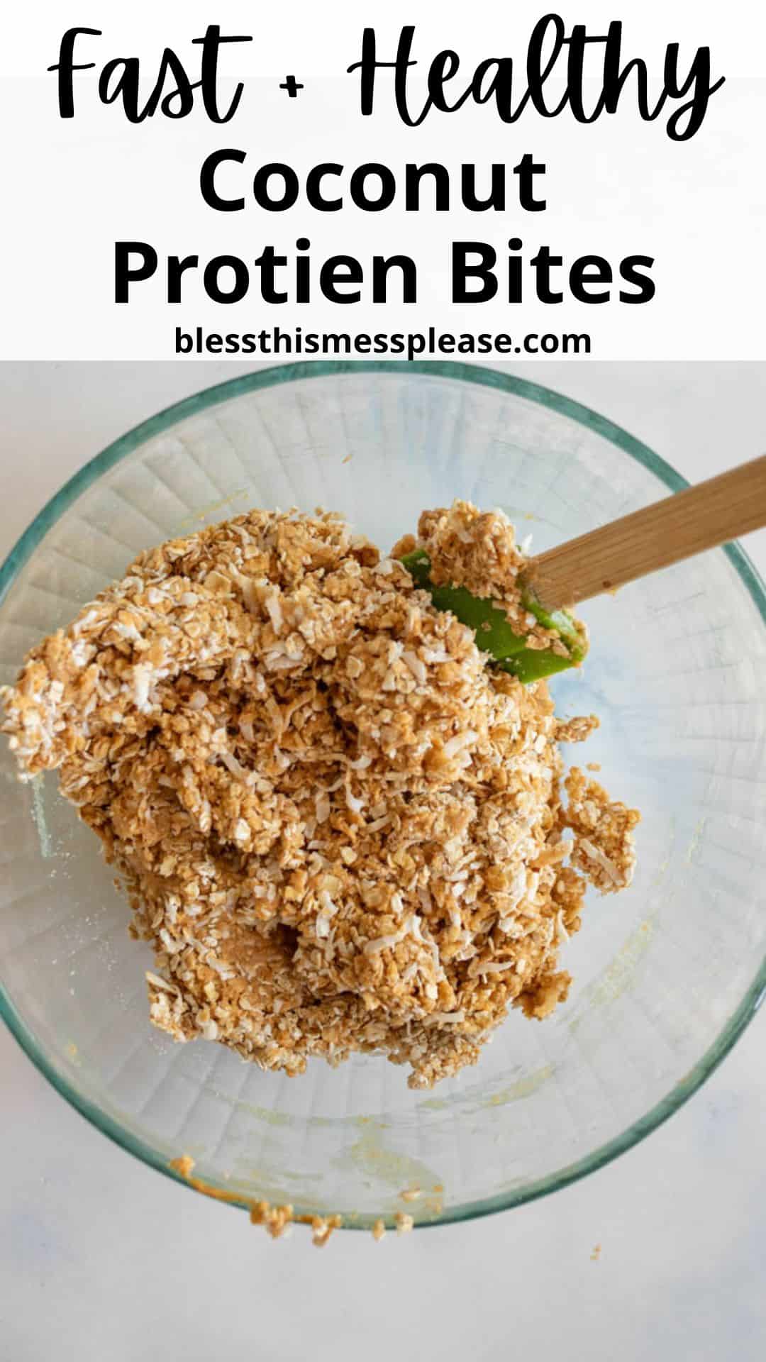 Glass bowl filled with a mixture of coconut flakes and other ingredients. A green spatula is resting in the bowl. Text on the image reads: Fast + Healthy Coconut Protein Bites with a website URL below.