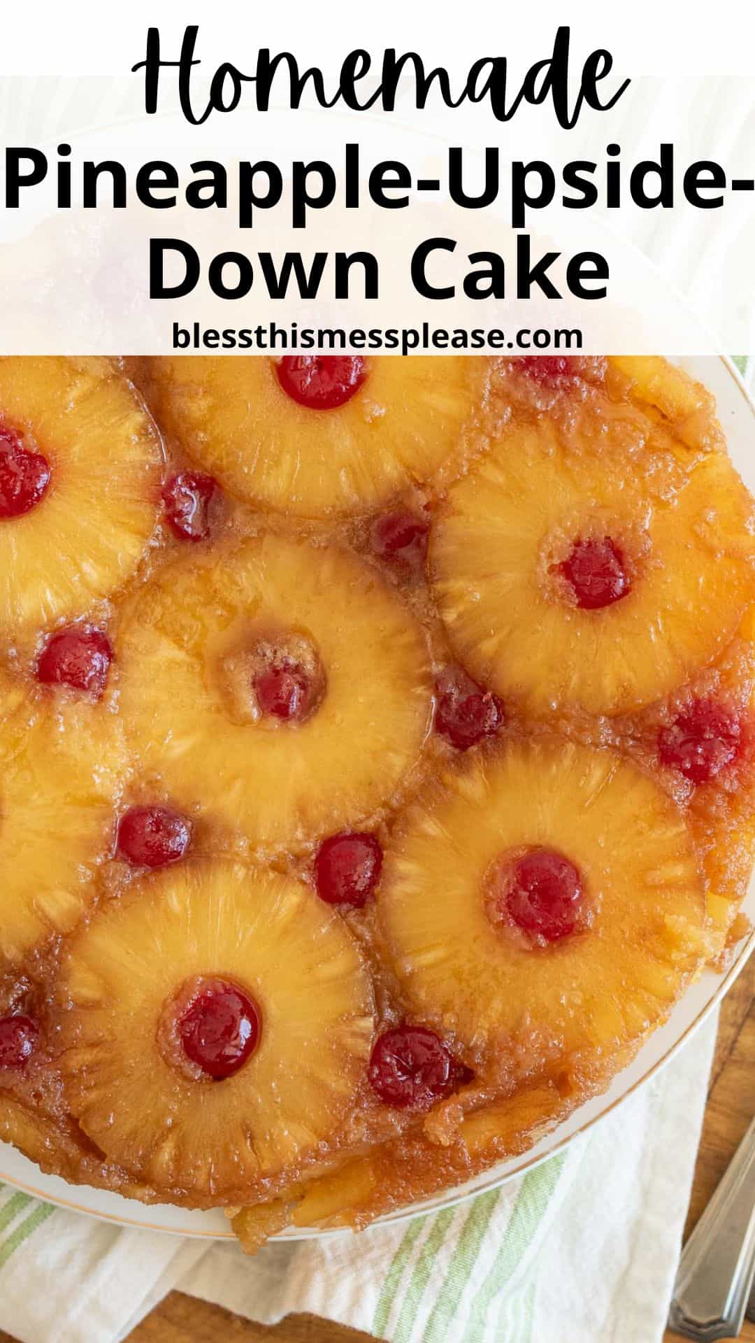 A homemade pineapple upside-down cake topped with pineapple rings and maraschino cherries, displayed on a white plate. The image includes the text Homemade Pineapple-Upside-Down Cake and blessthismessplease.com at the top.