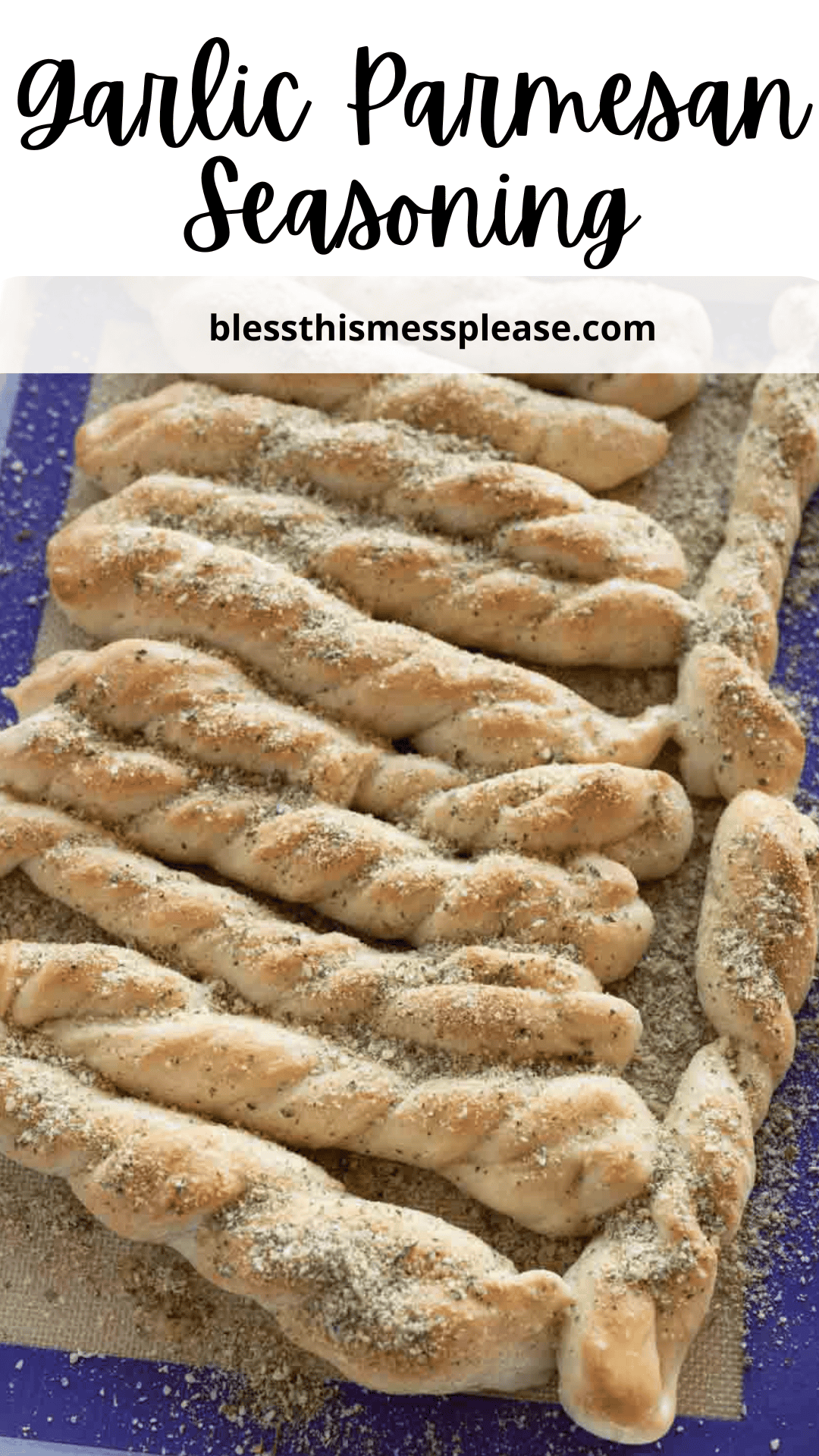 Twisted breadsticks sprinkled with garlic parmesan seasoning rest on a blue baking mat. Text at the top reads Garlic Parmesan Seasoning and blessthismessplease.com.