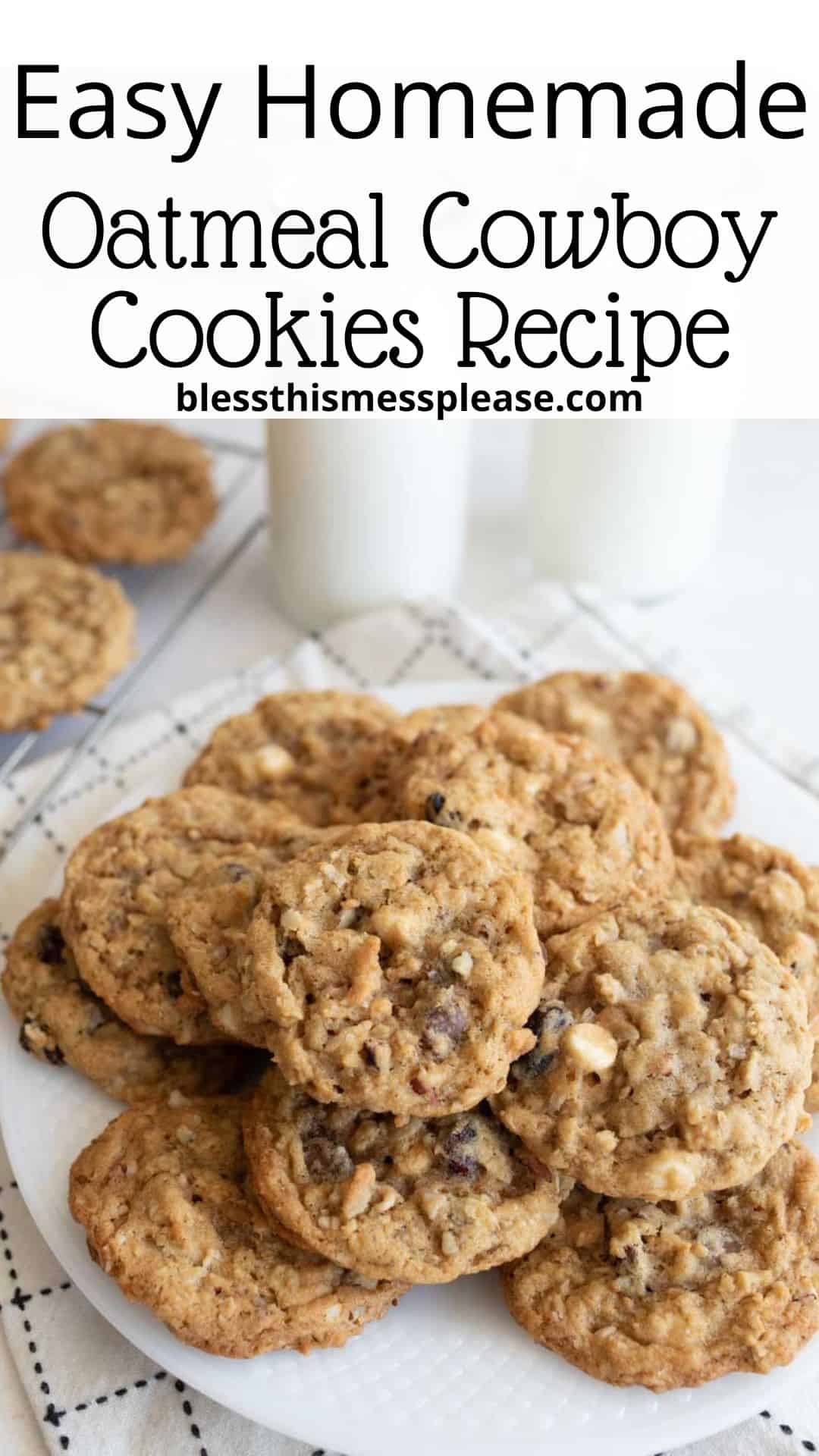 A plate of classic cowboy cookies with chocolate chips and oats sits on a checkered napkin; more cowboy cookies and glasses of milk are in the background. Text above reads: Easy Homemade Oatmeal Cowboy Cookies Recipe.
