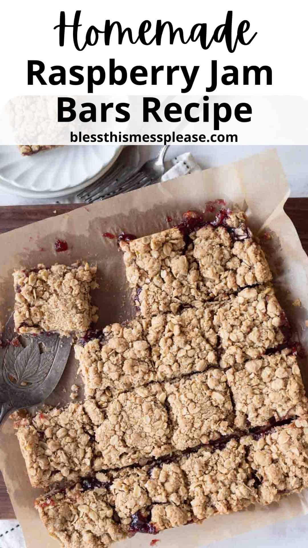 Overhead view of raspberry jam bars cut into squares on parchment paper, with a metal spatula lifting one piece. Text above reads Homemade Raspberry Jam Bars Recipe blessthismessplease.com.