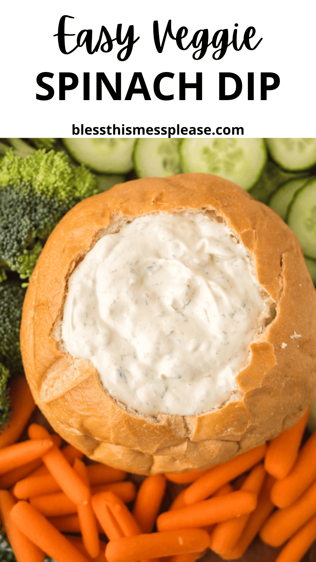 A round bread loaf filled with creamy Knorr veggie spinach dip is surrounded by baby carrots, broccoli, and cucumber slices on a platter. Text above reads: Easy Veggie Spinach Dip and blessthismessplease.com.