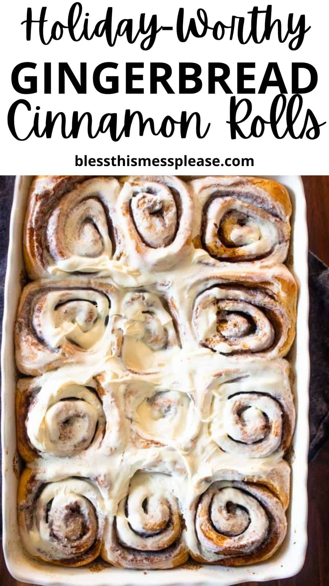 A rectangular pan filled with golden-brown gingerbread cinnamon rolls, some topped with creamy white icing. The text above reads Holiday-Worthy Gingerbread Cinnamon Rolls and blessthismessplease.com. Perfect for festive mornings!.