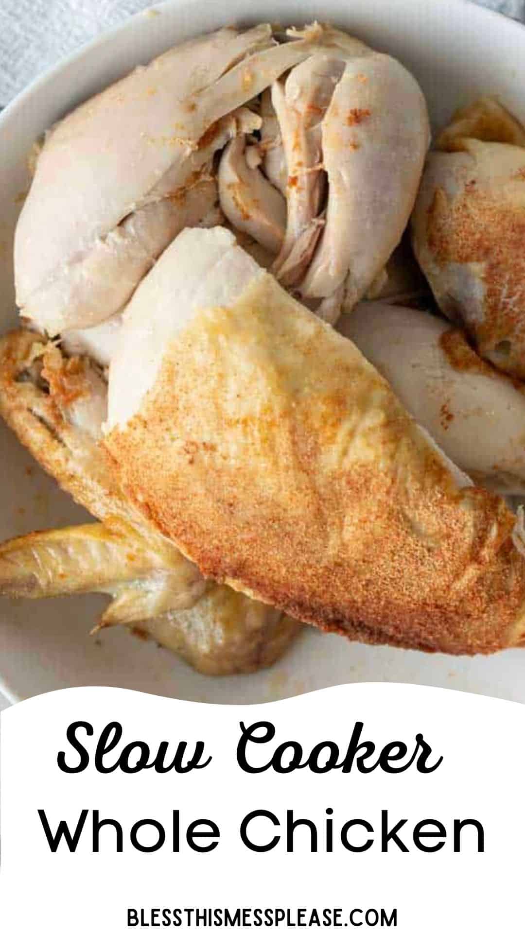 A plate filled with pieces of cooked slow cooker whole chicken, with golden brown skin, shown from above. Text at the bottom reads Slow Cooker Whole Chicken, blessthismessplease.com.