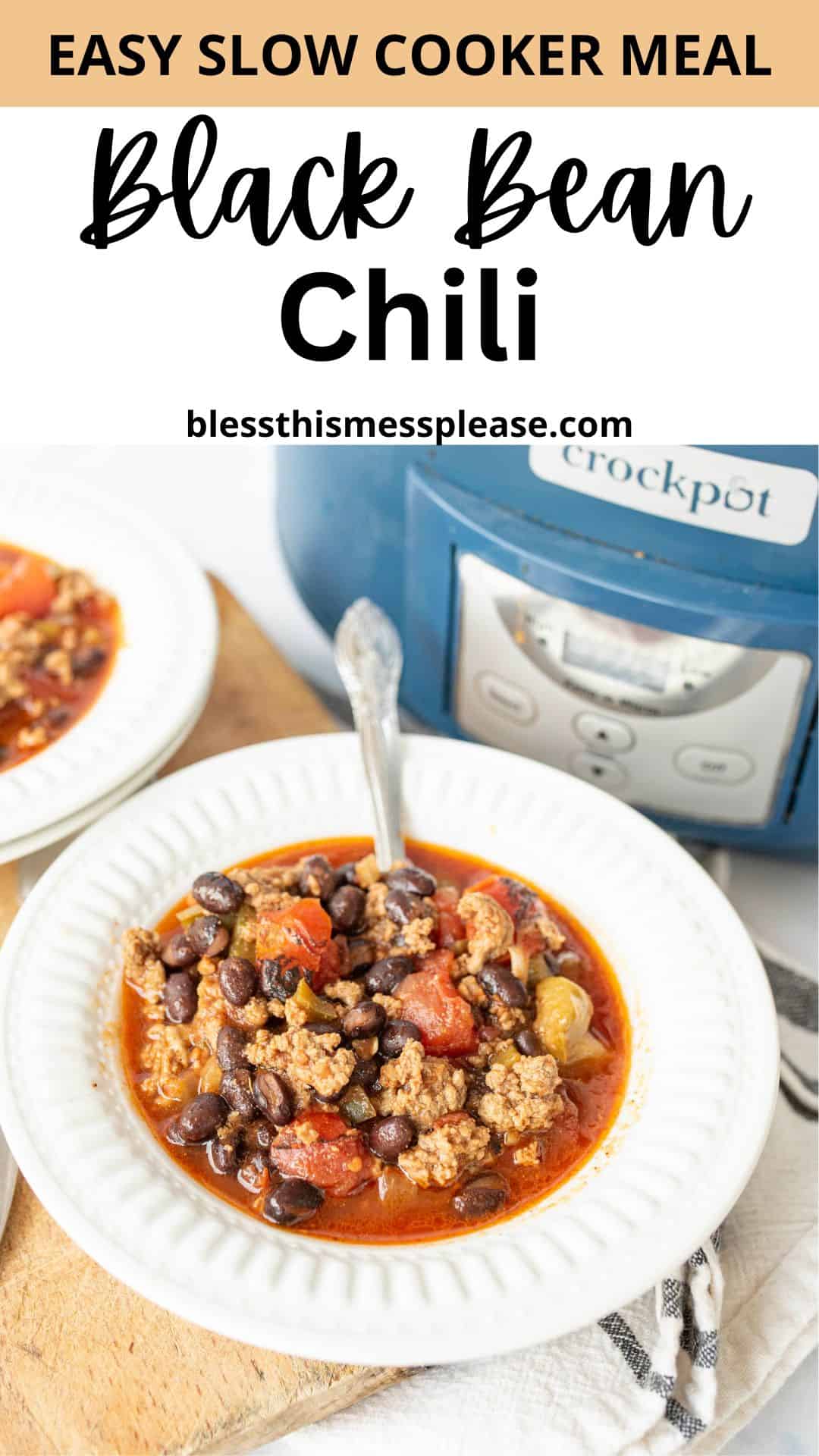 A bowl of black bean chili with ground meat, tomatoes, and beans sits on a white plate with a spoon. Another bowl and a blue Crockpot slow cooker are in the background. Text reads: Easy Slow Cooker Meal, Black Bean Chili recipe.