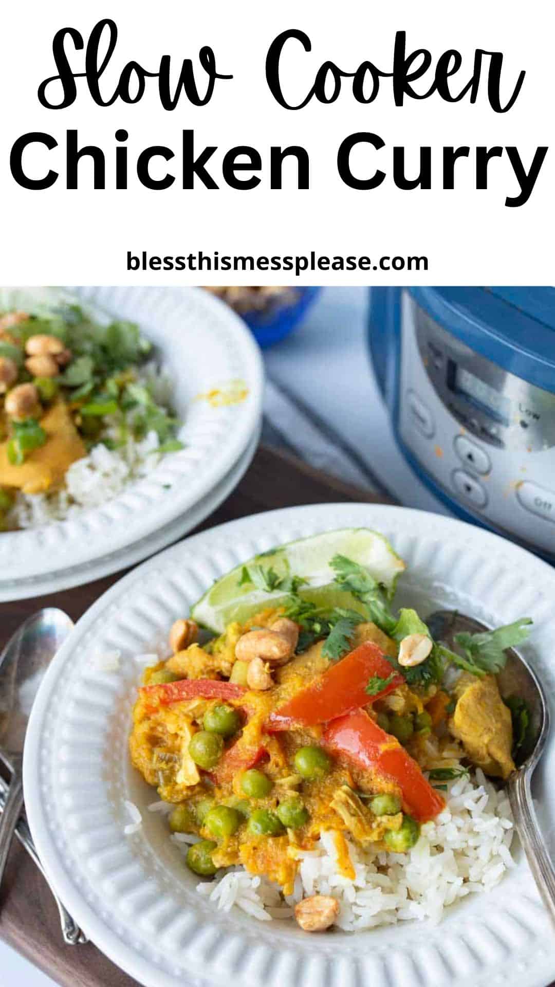 A bowl of rice topped with chicken in yellow curry, peas, red bell peppers, peanuts, and cilantro sits next to a slow cooker and another plate of food.