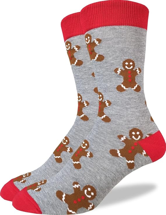 Gray socks with red toes, heels, and cuffs, featuring a repeating pattern of smiling brown gingerbread men decorated with white icing and red buttons.