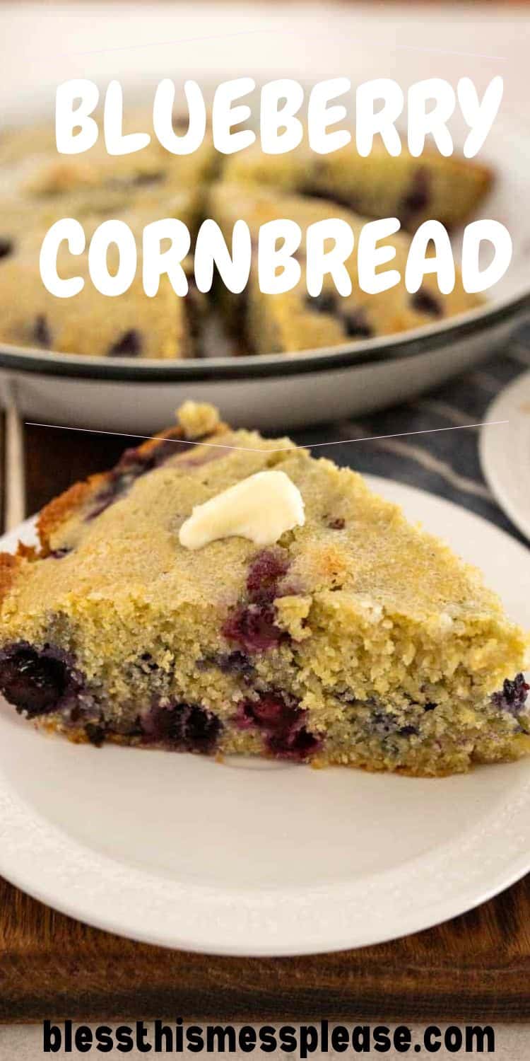 A slice of blueberry cornbread topped with a pat of butter sits on a white plate, while the remaining blueberry cornbread rests in the background. Text over the image reads Blueberry Cornbread.