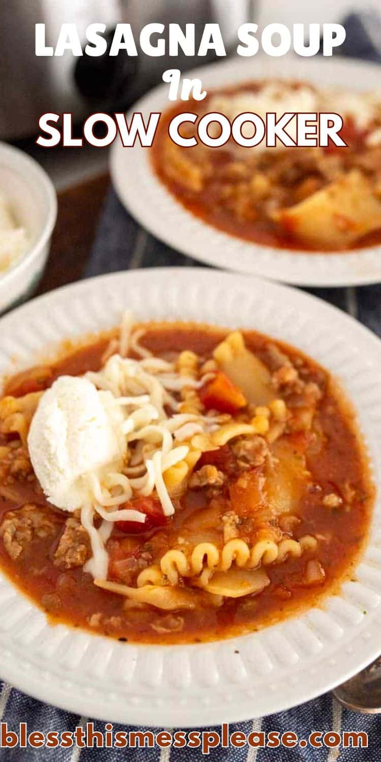 Two white plates filled with lasagna soup in slow cooker, topped with shredded cheese and a dollop of ricotta. The hearty soup features noodles, ground meat, and tomatoes. Text reads “Lasagna Soup in Slow Cooker.” Website: blessthismessplease.com.
