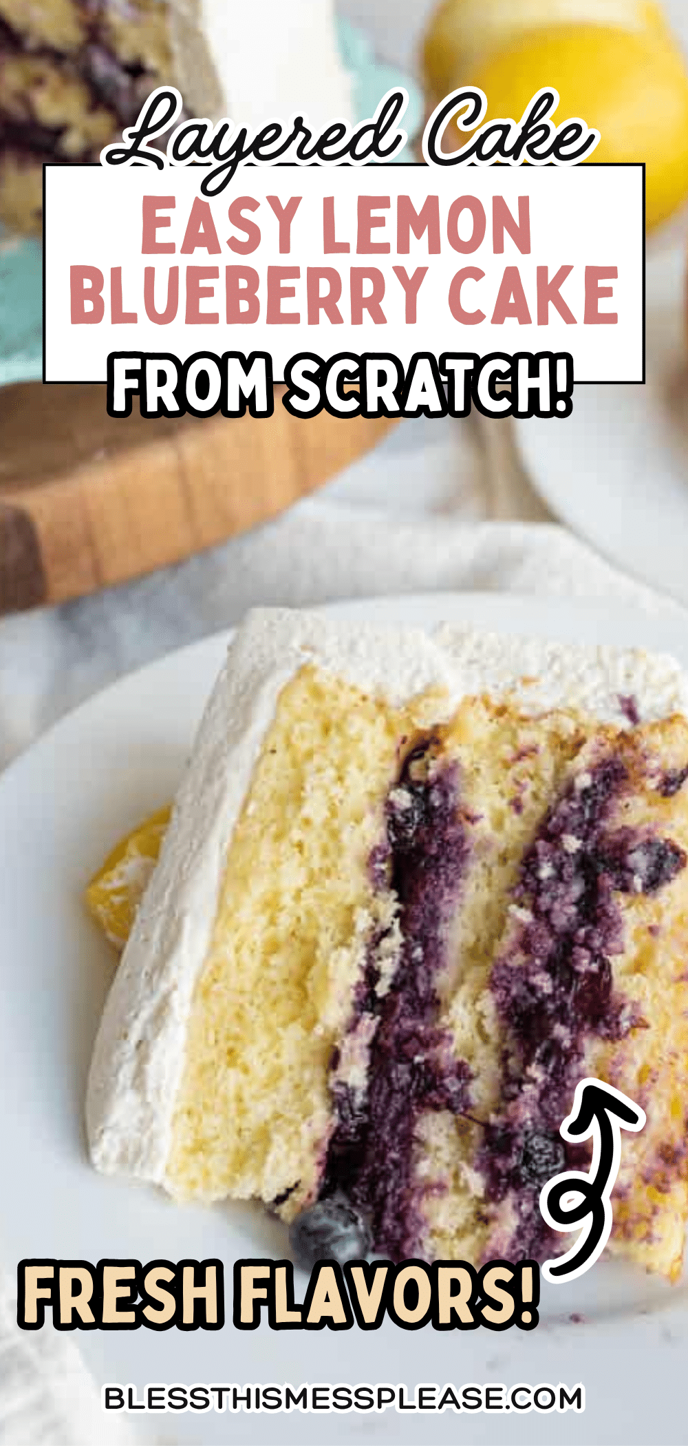 A slice of lemon blueberry cake with white frosting sits on a plate. The cake has two yellow layers with a blueberry filling in the middle. Text over the image reads, Easy Lemon Blueberry Cake From Scratch! Fresh Flavors!.
