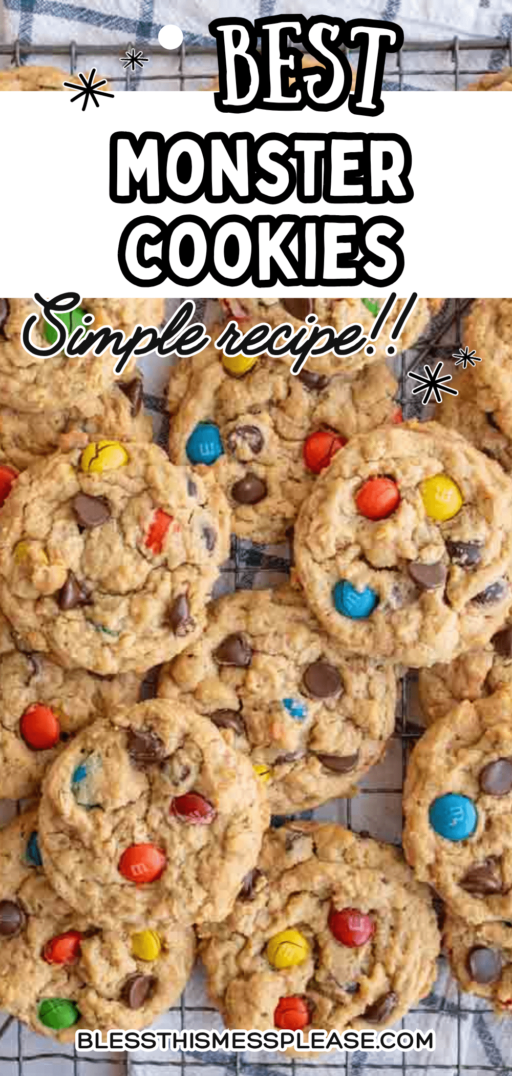A batch of homemade monster cookies filled with colorful chocolate candies and chocolate chips is arranged on a baking sheet. Text on the image reads: “Best Monster Cookies, Simple recipe!!” and “blessthismessplease.com.”.